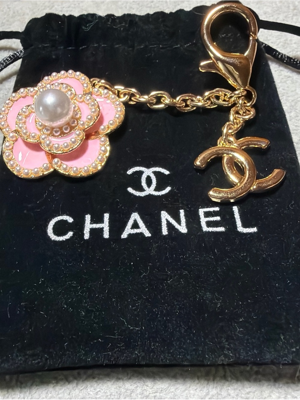 CHANEL Pink Enamel Camellia Bag Charm with Gold CC